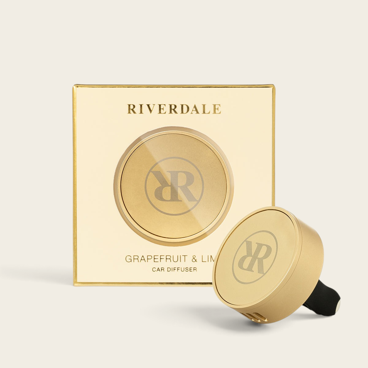 Riverdale car diffuser set in gold with Grapefruit and Lime scent tablets and a sleek metallic holder