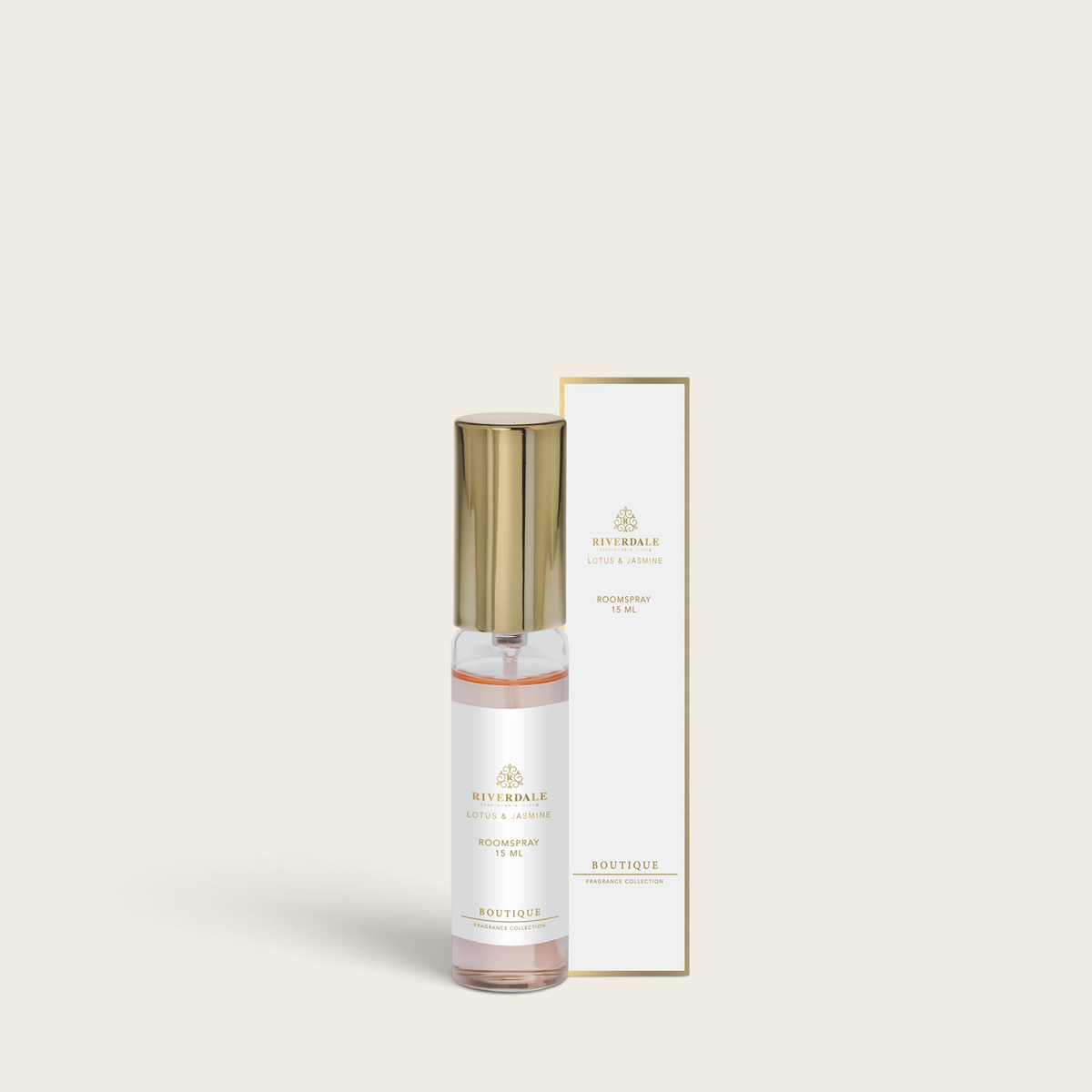 Riverdale Boutique Lotus & Jasmine roomspray in a 15ml glass bottle with a gold cap next to its elegant white box.