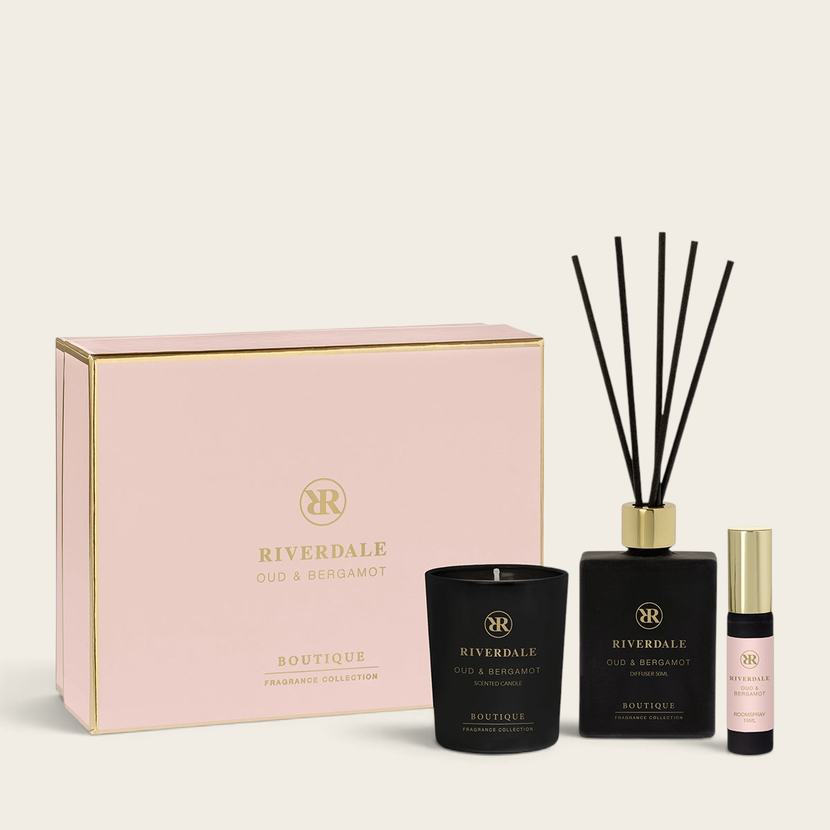 Riverdale Oud & Bergamot gift set featuring a scented candle, reed diffuser, and room spray in elegant black packaging.
