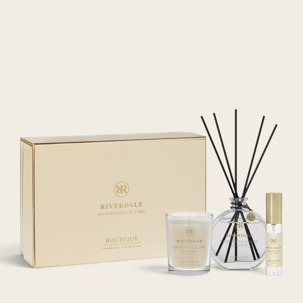Riverdale Boutique Grapefruit & Lime gift set featuring a scented candle, reed diffuser, and roomspray in a gold box.