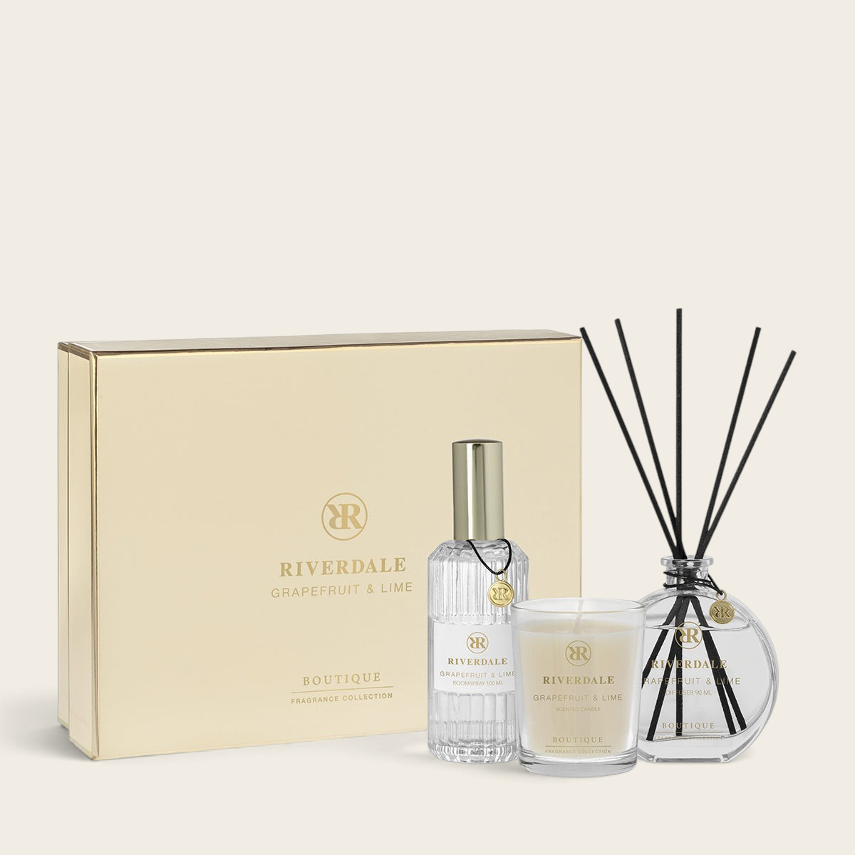 Riverdale Boutique Grapefruit & Lime gift set with scented candle, reed diffuser, and roomspray in a gold box.