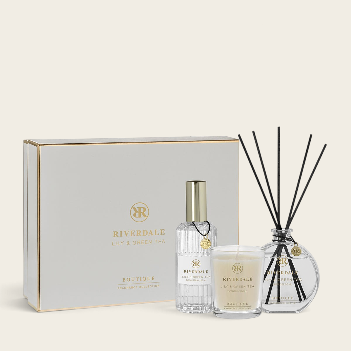 Riverdale Lily & Green Tea fragrance gift set featuring a reed diffuser, scented candle, and room spray in a box.