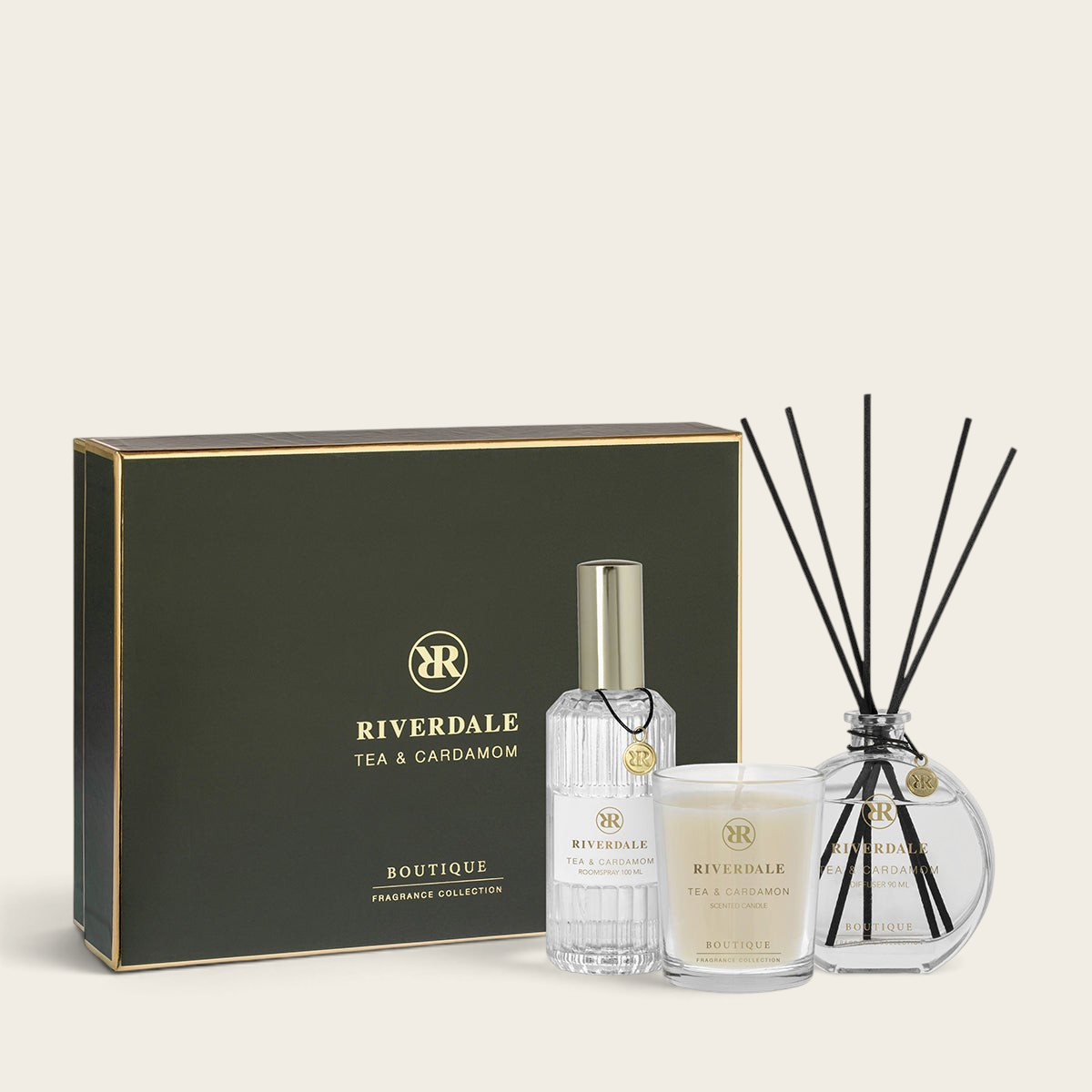 Riverdale Tea & Cardamom gift set featuring a diffuser, scented candle, and room spray in a dark green presentation box