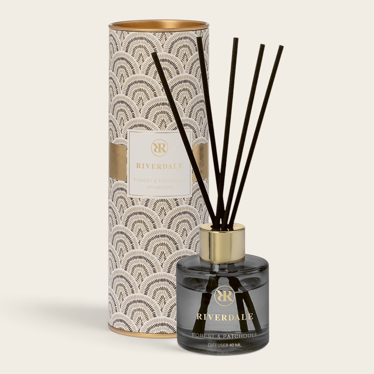 Riverdale Olivia Forest & Patchouli reed diffuser in a grey glass bottle with black sticks and decorative tube.