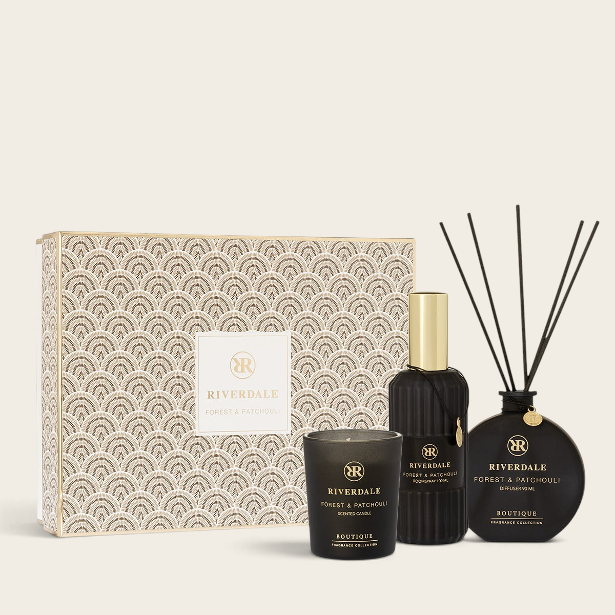 Riverdale Forest & Patchouli gift set with scented candle, reed diffuser, and room spray in a decorative box.