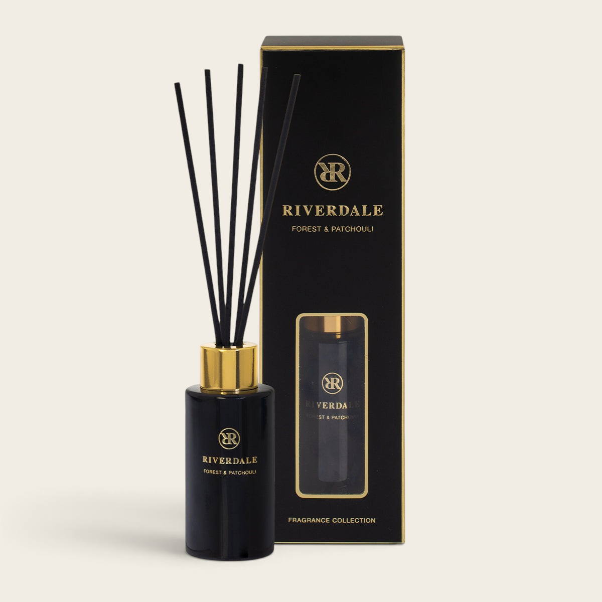 Riverdale Boutique Forest & Patchouli reed diffuser in a black glass bottle with black sticks and matching gift box.