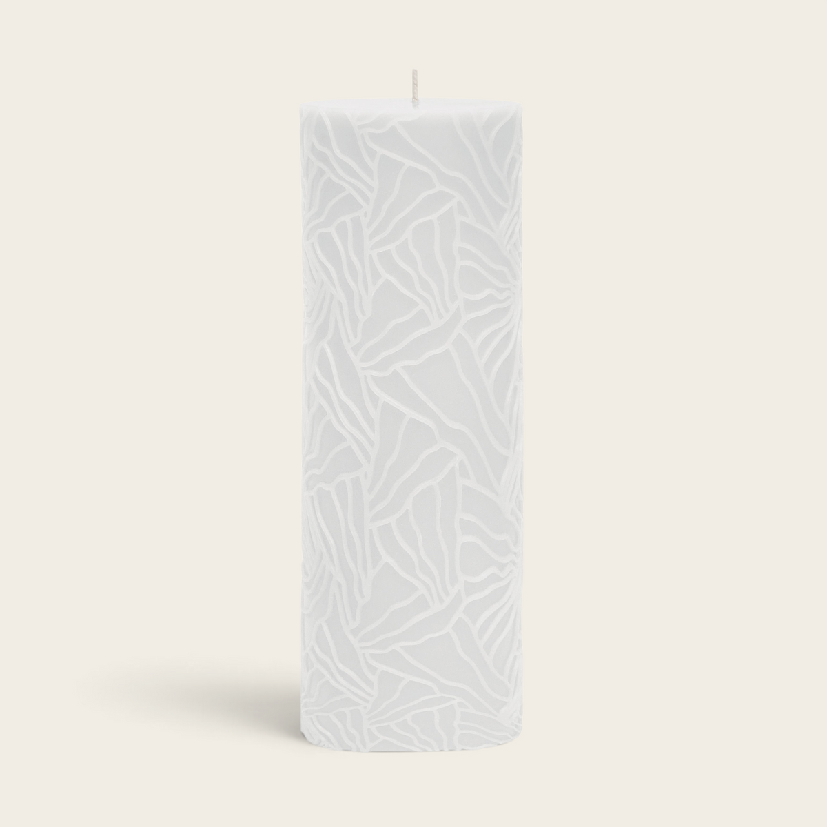 Riverdale white pillar candle with a unique oyster mushroom inspired wave texture, 7x20cm size.