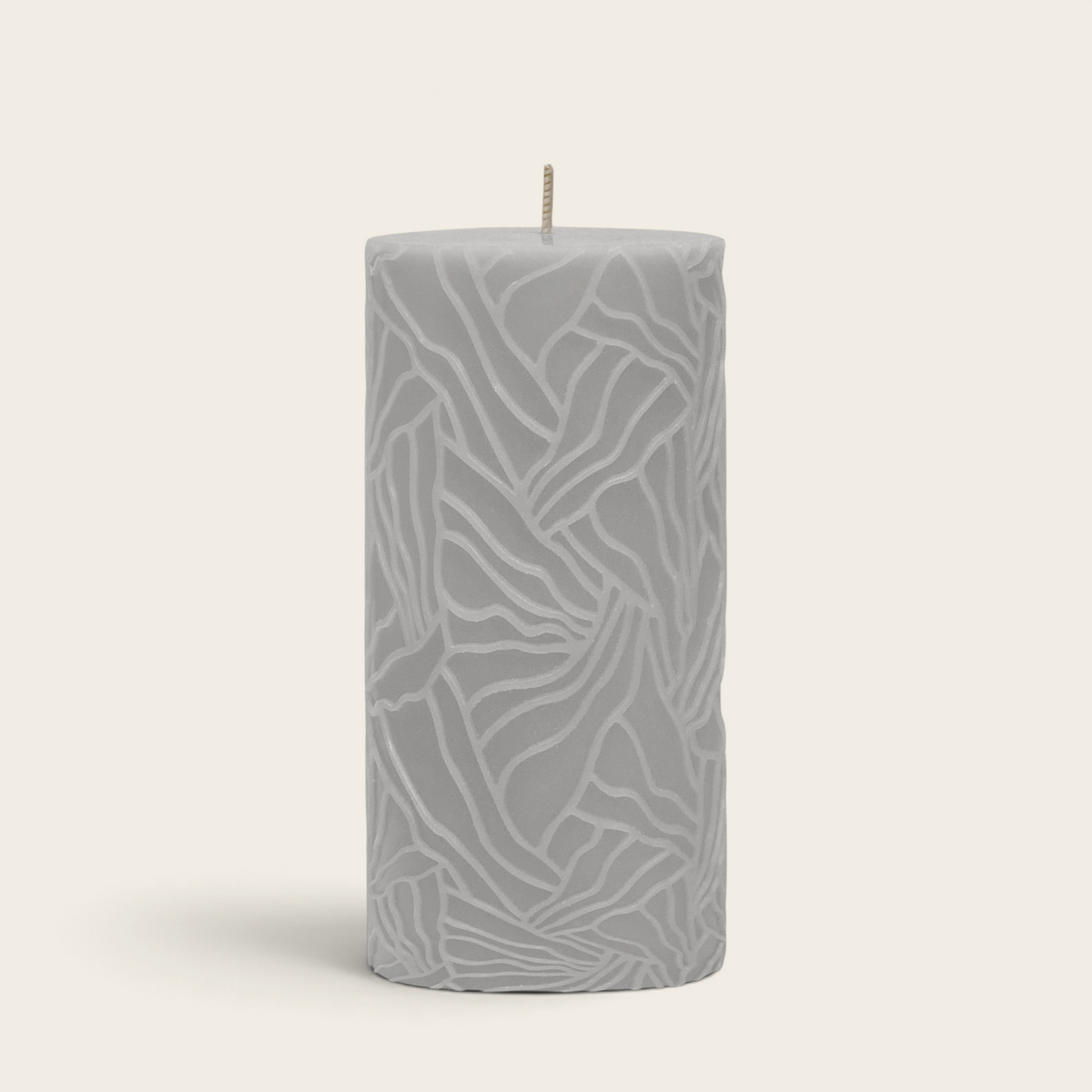 Riverdale light grey pillar candle with a textured wave pattern design for home decor