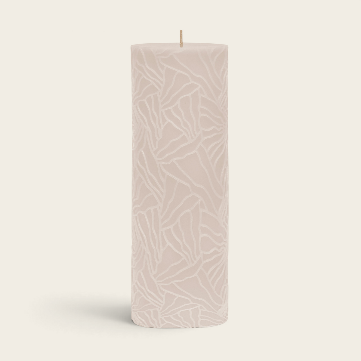Riverdale Wave beige pillar candle with a textured oyster mushroom pattern, 20cm tall.