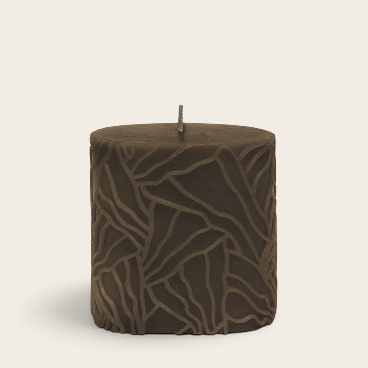 Riverdale brown pillar candle with a textured oyster mushroom-inspired wave pattern, 9x9cm size.