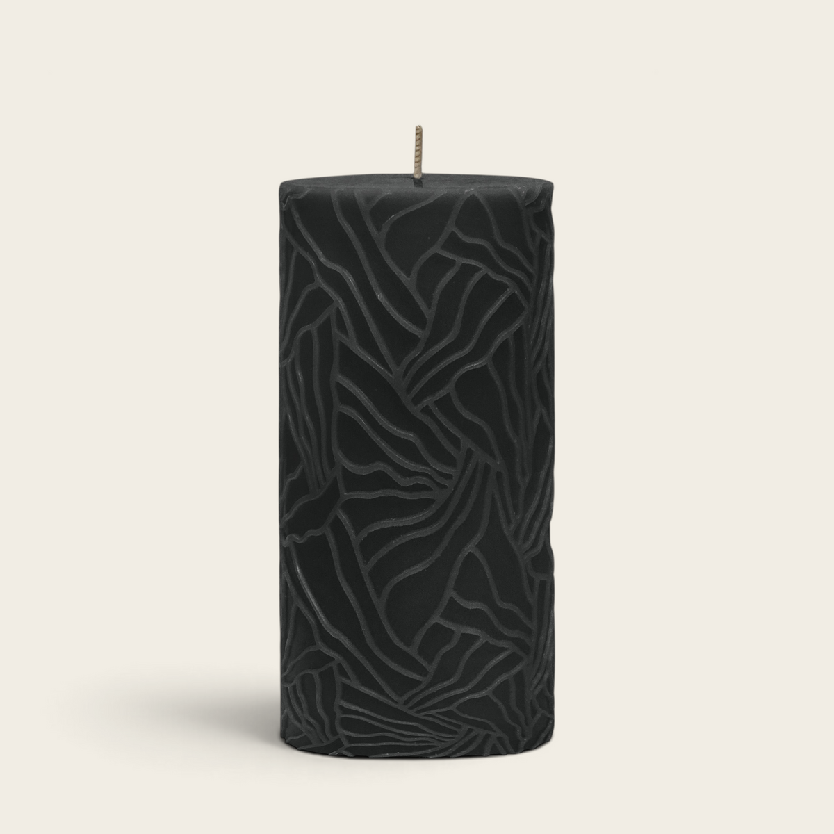Riverdale black pillar candle with a textured wave pattern design, 7x14cm, perfect for modern home decor.