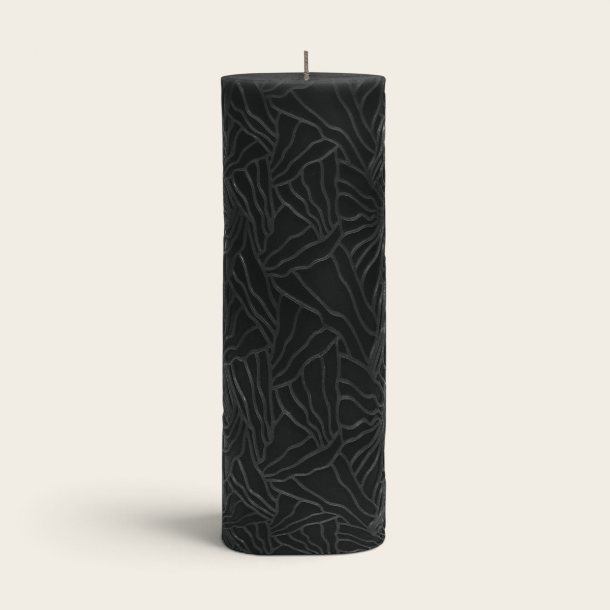 Riverdale black pillar candle with a textured wave pattern, 7x20cm size for elegant home decor.