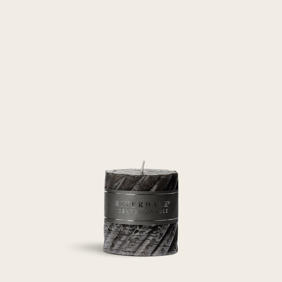 Riverdale Swirl Arabian Nights scented pillar candle in dark grey with a textured spiral design