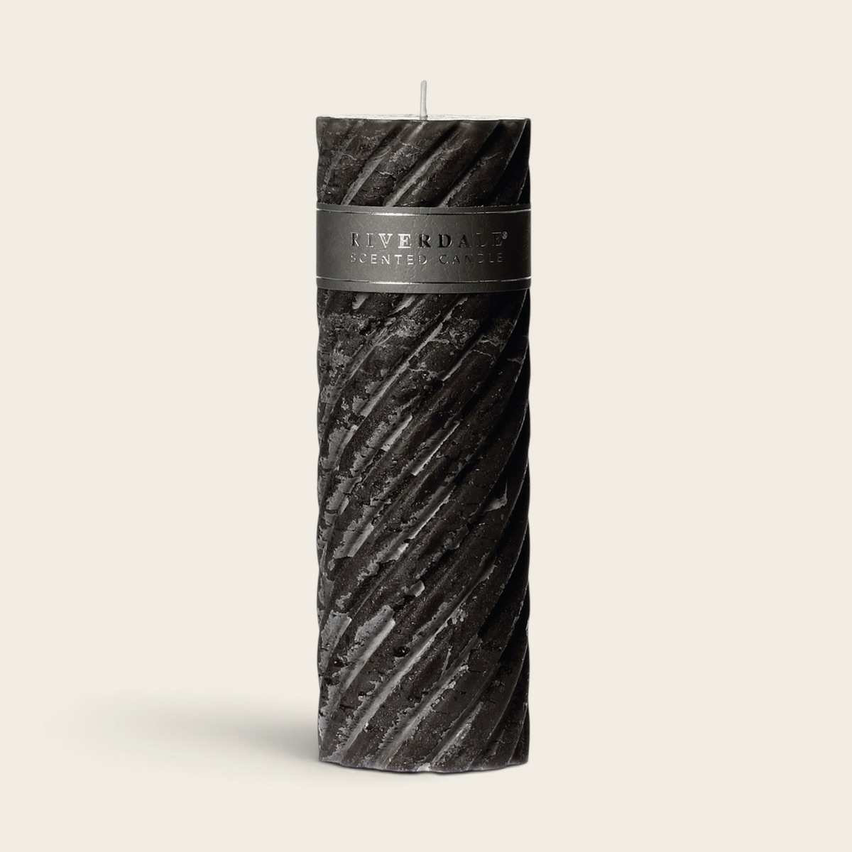 Riverdale Swirl Arabian Nights scented pillar candle in dark grey with a textured spiral design, 23cm tall.