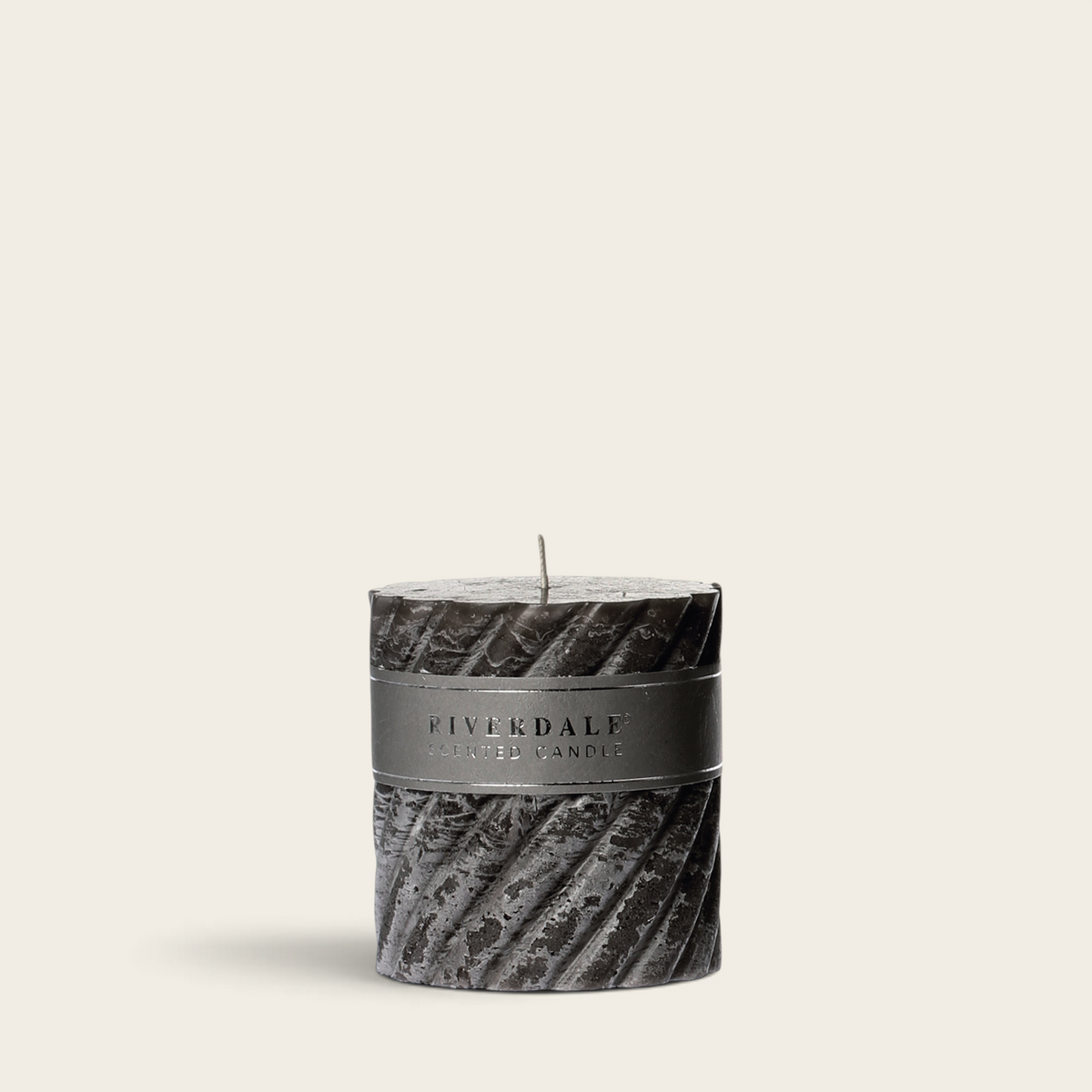 Riverdale Swirl Arabian Nights scented pillar candle in dark grey with a textured spiral design