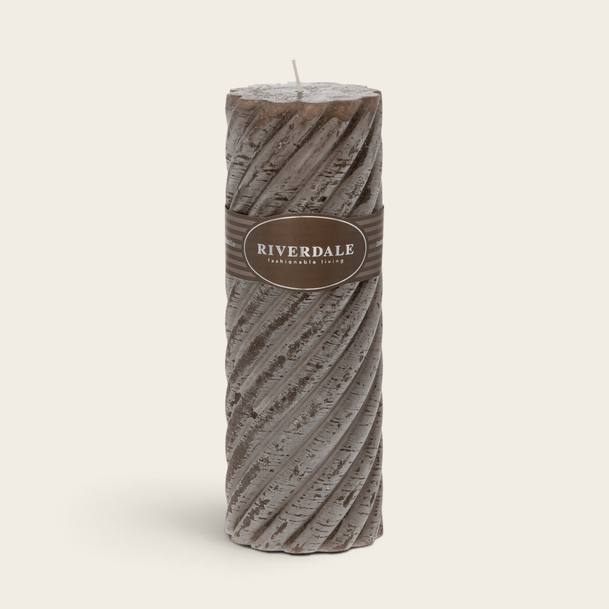 Riverdale Swirl pillar candle in dark grey with a textured spiral design and White Chocolate scent label