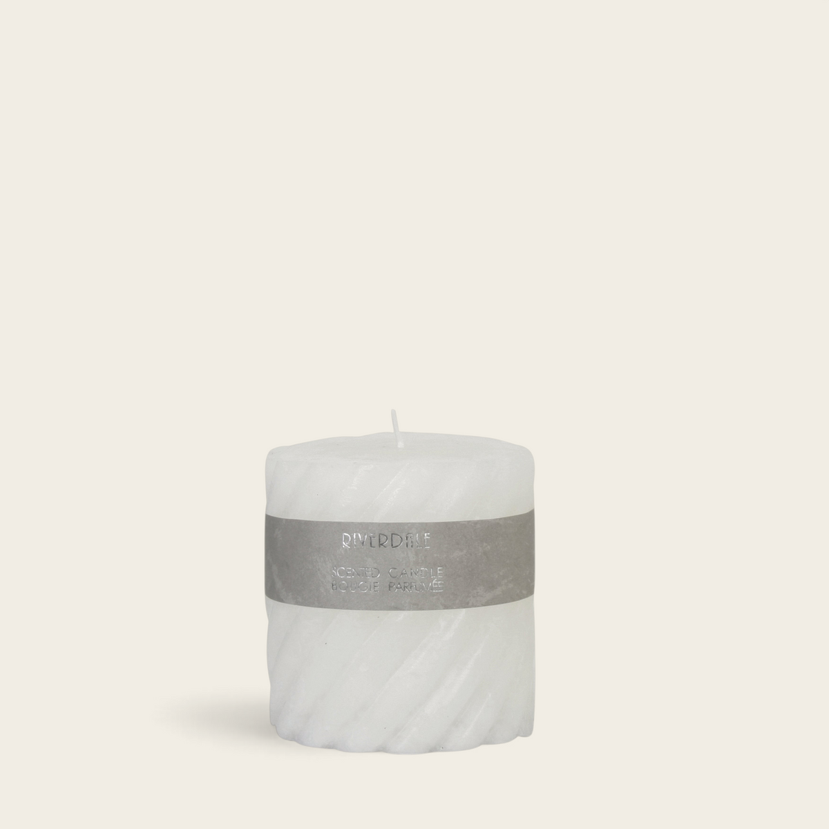 Riverdale white pillar candle with a decorative swirl texture and White Tea Ginger scent, 10x10cm size.