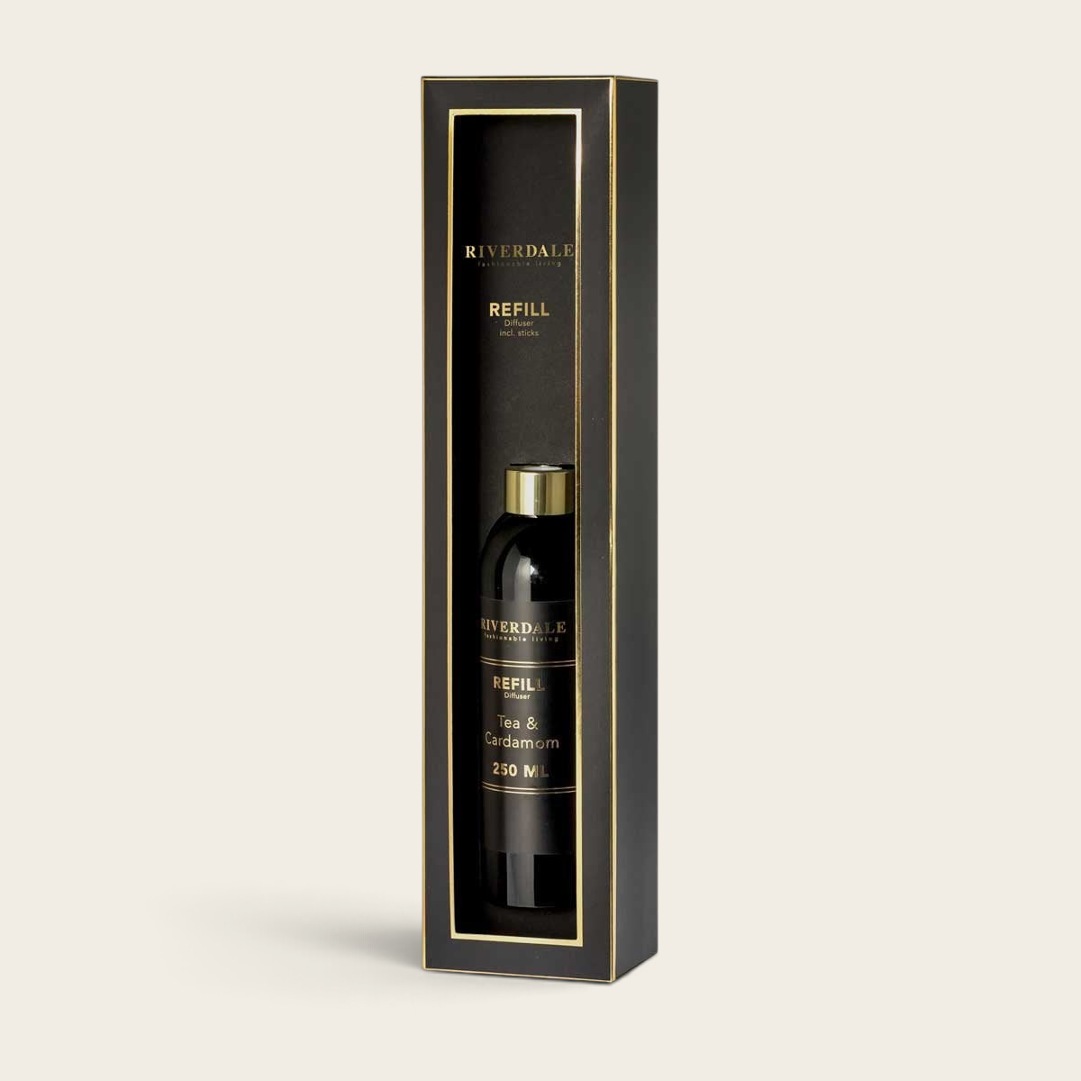 Riverdale Tea & Cardamom reed diffuser refill bottle in a black and gold gift box, 250ml capacity.