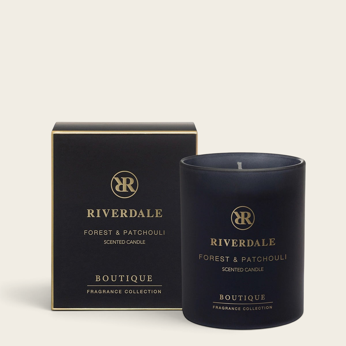 Riverdale Boutique Forest & Patchouli scented candle in a matte black glass jar with matching gift box