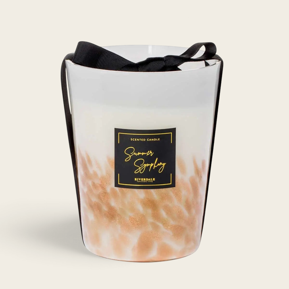 Riverdale Sense L Summer Symphony scented candle in a decorative glass jar with a gold effect and black ribbon detail.