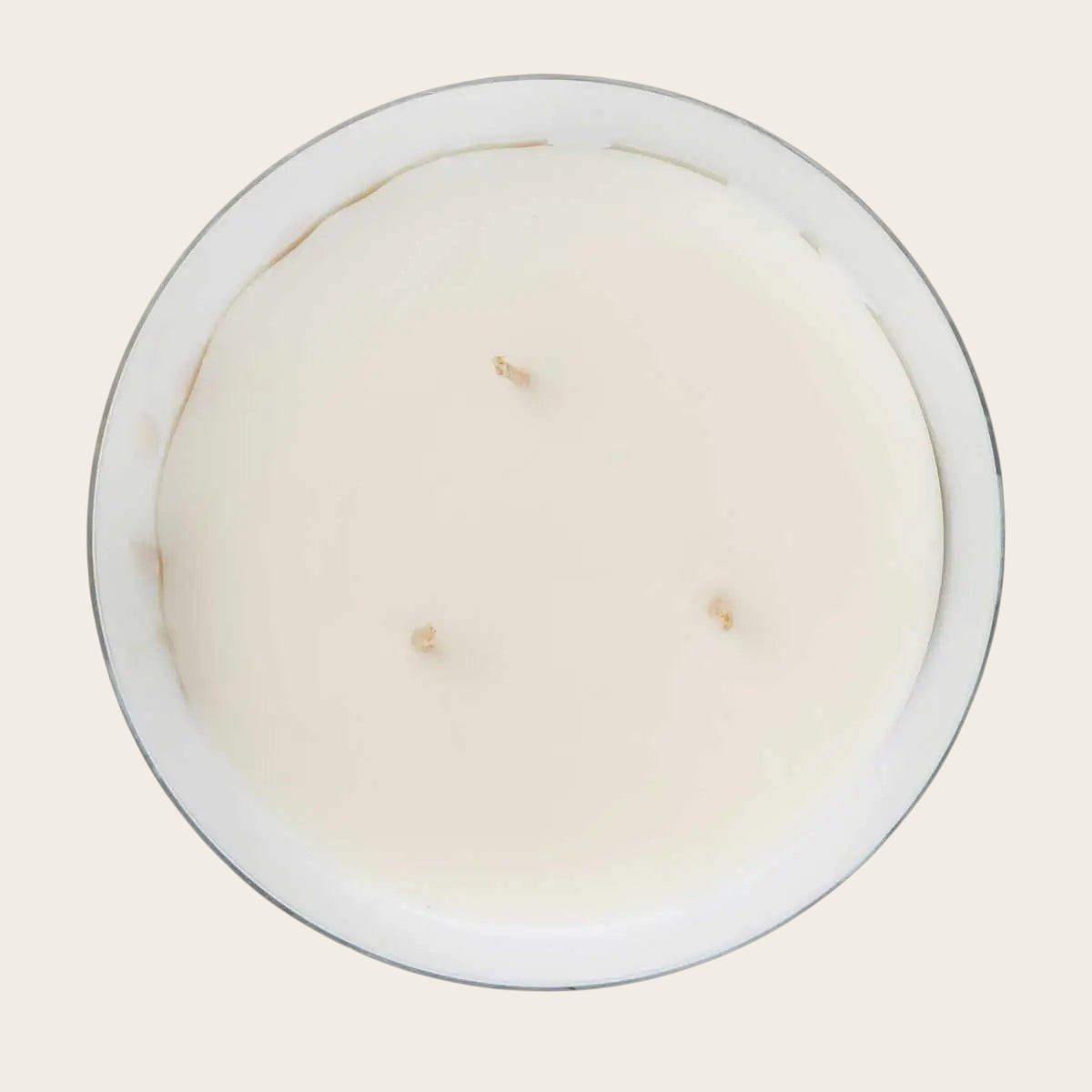 Riverdale Sense L Vanilla Vibes scented candle in a white glass jar with three wicks, viewed from above.