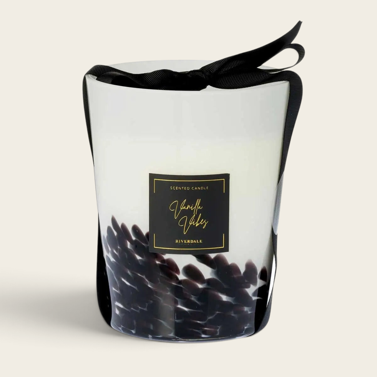 Riverdale Sense L Vanilla Vibes scented candle in a white glass jar with black decorative accents and a black ribbon.