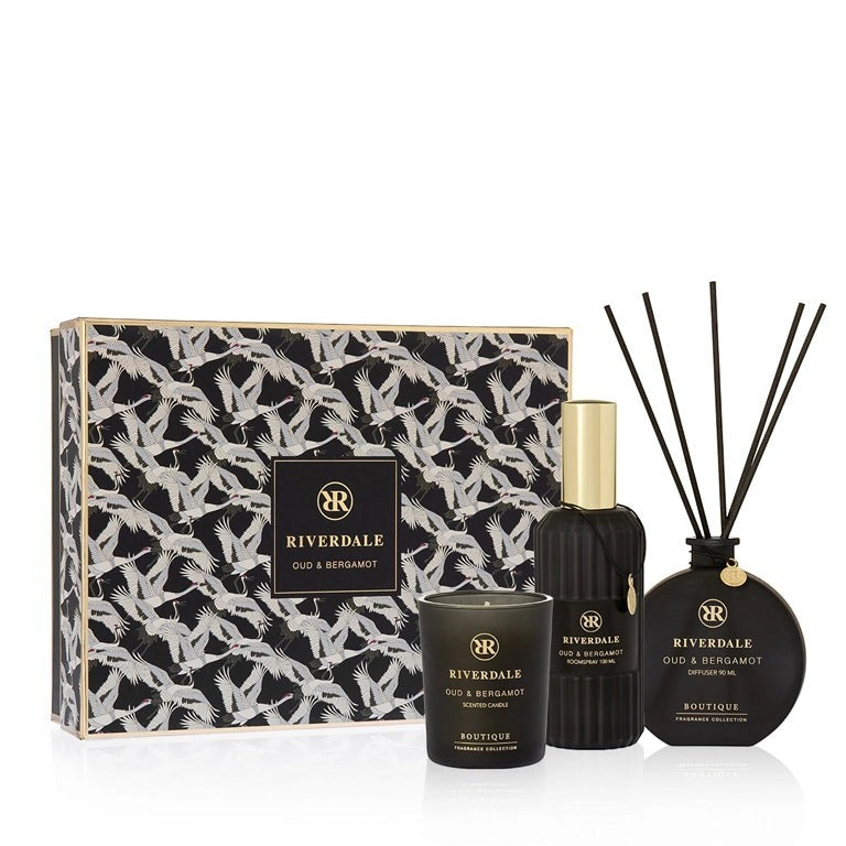 Riverdale Oud & Bergamot gift set with scented candle, room spray, and reed diffuser in a decorative patterned box.